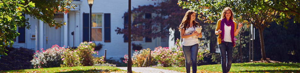 Female Students Walking on Campus