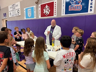 Dr. Wilson conducting flame tests
