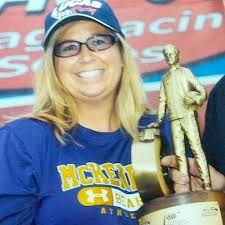 Tami Eggleston with Racing Trophy