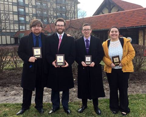 Kyle Garrett, Kyle Smith, Caden Owens and Rebecca Postula at Webster University’s Gorlok Gala speech tournament.