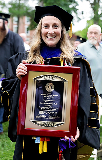 Photo of Dr. Sara (Trask) Frank with Award