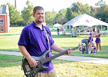 Male Student Playing Guitar