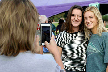 Parent Taking Photo of Student