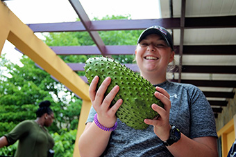 Bryce Bambic Holding a Soursop Fruit