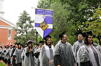 Students at Commencement in Rain