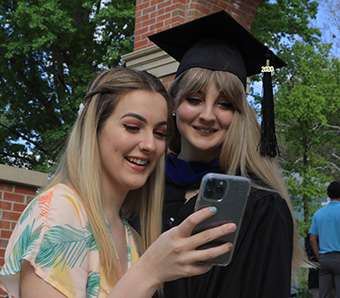 Graduate Taking Phone