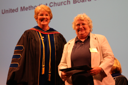 Dr. Christine Bahr congratulates Martha McDonald