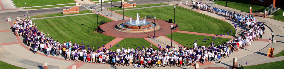 Photo of the Faculty, Staff and Studentys Forming the Letter U on Campus